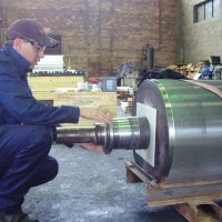 Preparing mill roll shaft for bearing assembly